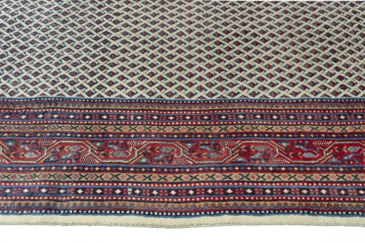 Close-up detail of 2000s Sarough Mir rug from Iran / Persia showing Wool weave