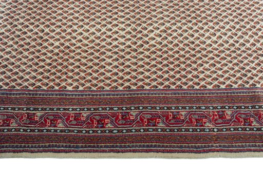 Close-up detail of 2000s Sarough Mir rug from Iran / Persia showing Wool weave