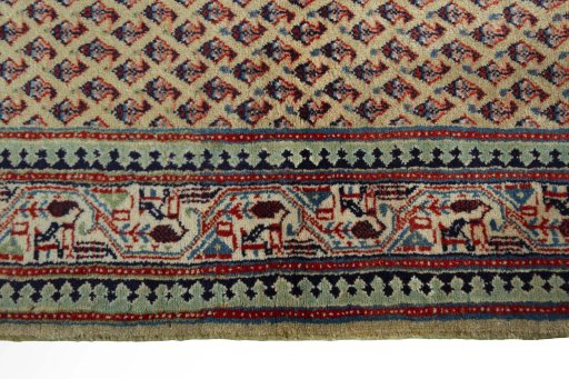 Close-up detail of 2000s Sarough Mir rug from Iran / Persia showing Wool weave