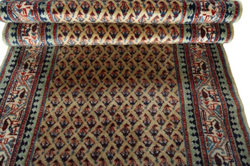 Full view of 1970s Sarough Mir rug from Iran / Persia, 616 × 87 cm in Beige tones