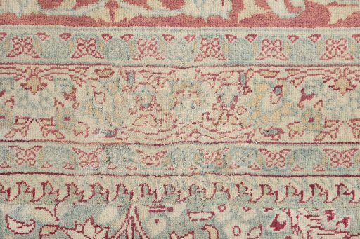 Corner detail of 1920s Tabriz rug showing border pattern and Wool pile