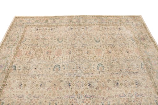Surface texture of 1920s Tabriz rug with natural Wool and intricate pattern