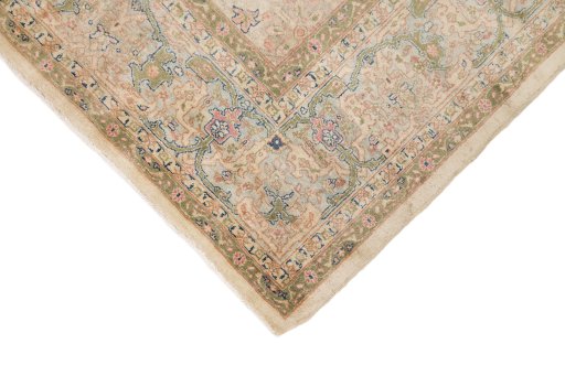 Backside of handmade 1920s Tabriz rug showing knot structure and weave density