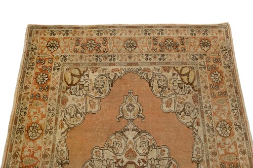 Surface texture of 1900s Tabriz rug with natural Wool and intricate pattern
