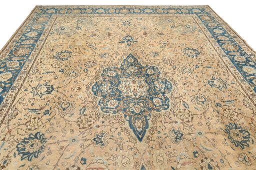 Surface texture of 1920s Tabriz rug with natural Wool and intricate pattern