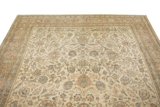 Surface texture of 1900s Tabriz rug with natural Wool and intricate pattern