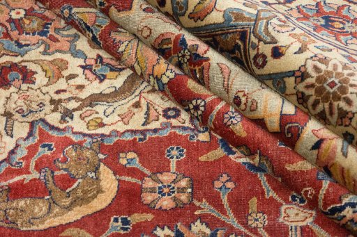 Corner detail of 1920s Tabriz rug showing border pattern and Wool pile