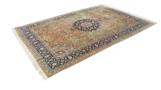 Corner detail of 1980s Tabriz rug showing border pattern and Wool pile