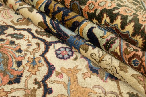 Full view of 1900s Tabriz rug from Iran / Persia, 385 × 290 cm in Cream tones