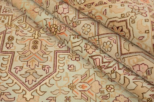 Close-up detail of New Tabriz rug from Iran / Persia showing Wool weave
