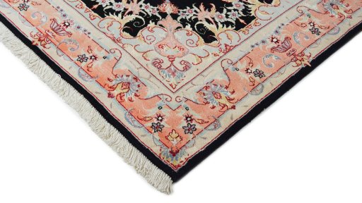Backside of handmade 1980s Tabriz rug showing knot structure and weave density