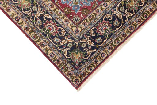 Backside of handmade 1990s Tabriz rug showing knot structure and weave density