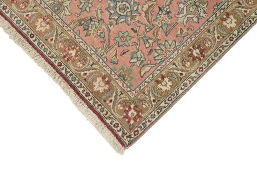 Backside of handmade 1950s Tabriz rug showing knot structure and weave density