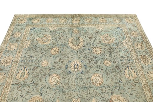Surface texture of 1940s Tabriz rug with natural Wool and intricate pattern