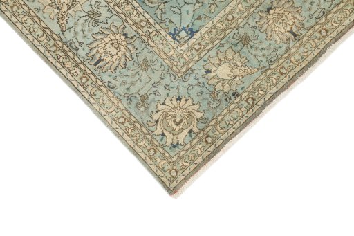 Backside of handmade 1940s Tabriz rug showing knot structure and weave density