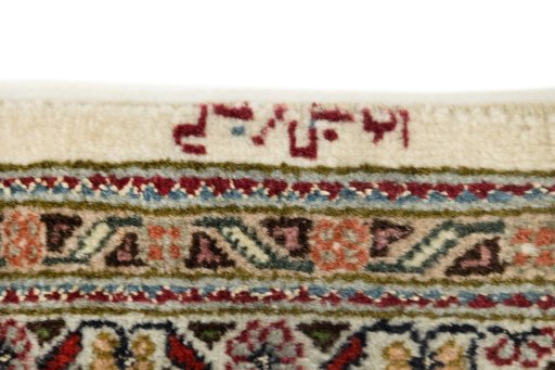 Close-up detail of New Tabriz rug from Iran / Persia showing Wool weave