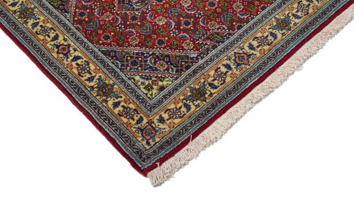 Surface texture of 1970s Tabriz rug with natural Wool and intricate pattern
