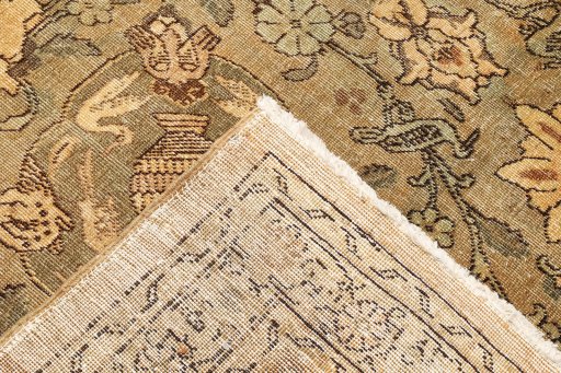 Corner detail of 1950s Tabriz rug showing border pattern and Wool pile