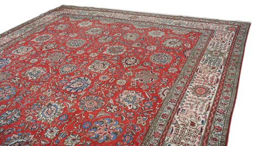 Surface texture of 1950s Tabriz rug with natural Wool and intricate pattern