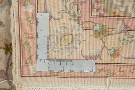 Close-up detail of 1990s Tabriz rug from Iran / Persia showing Wool weave