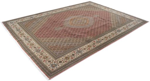 Corner detail of 1990s Tabriz rug showing border pattern and Wool pile