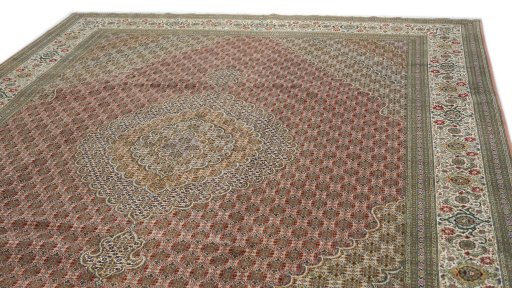 Surface texture of 1990s Tabriz rug with natural Wool and intricate pattern