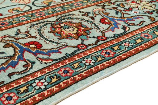 Backside of handmade 1940s Tabriz rug showing knot structure and weave density
