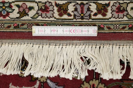 Full view of 1990s Tabriz rug from Iran / Persia, 295 × 202 cm in Dark red tones