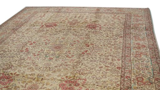 Surface texture of 1940s Tabriz rug with natural Wool and intricate pattern