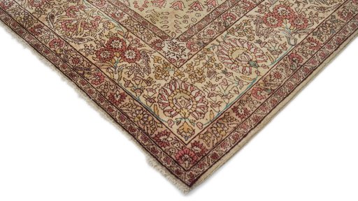 Backside of handmade 1940s Tabriz rug showing knot structure and weave density