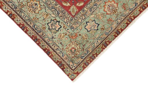 Backside of handmade 1940s Tabriz rug showing knot structure and weave density