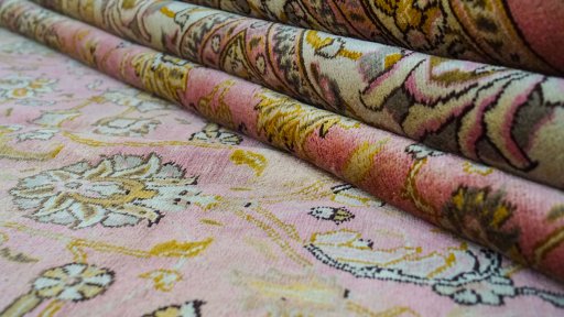 Close-up detail of 1960s Tabriz rug from Iran / Persia showing Wool weave