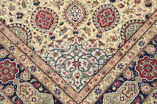Corner detail of 1960s Tabriz rug showing border pattern and Wool pile