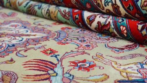 Close-up detail of 1950s Tabriz rug from Iran / Persia showing Wool weave