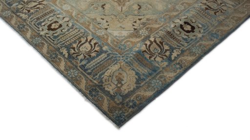 Backside of handmade 1950s Tabriz rug showing knot structure and weave density