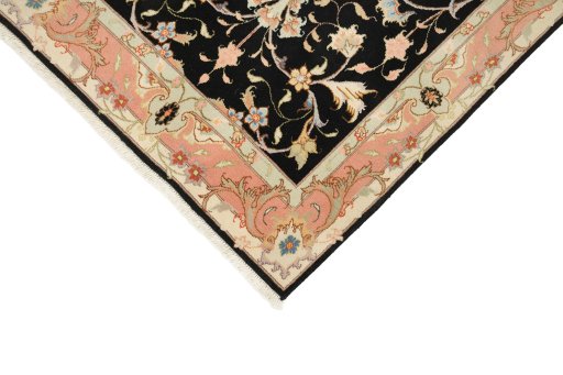Backside of handmade New Tabriz rug showing knot structure and weave density