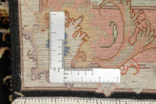 Close-up detail of New Tabriz rug from Iran / Persia showing Wool weave