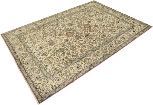 Corner detail of New Tabriz rug showing border pattern and Wool pile