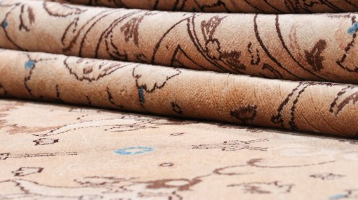 Corner detail of 1920s Tabriz rug showing border pattern and Wool pile