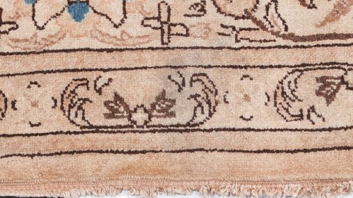 Surface texture of 1920s Tabriz rug with natural Wool and intricate pattern