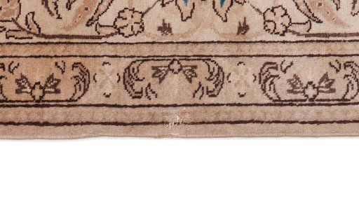 Central medallion detail of 1920s Tabriz rug from Iran / Persia