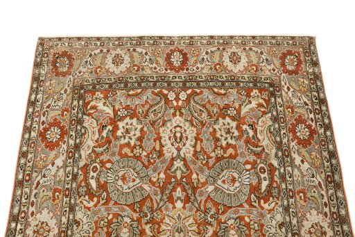 Surface texture of 1940s Tabriz rug with natural Wool and intricate pattern