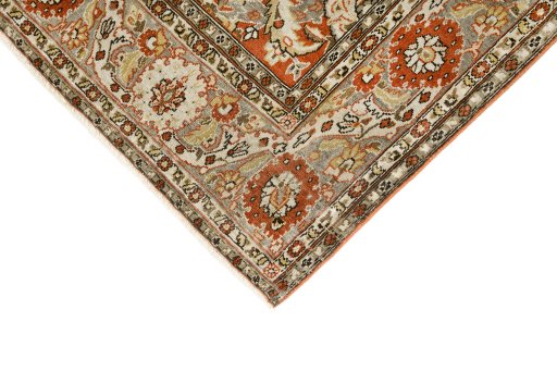 Backside of handmade 1940s Tabriz rug showing knot structure and weave density