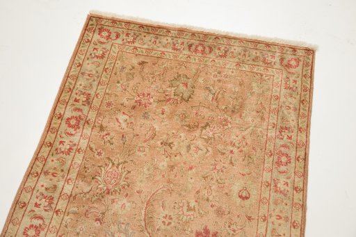 Surface texture of 1950s Tabriz rug with natural Wool and intricate pattern