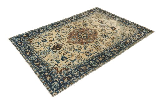Corner detail of 1940s Tabriz rug showing border pattern and Wool pile