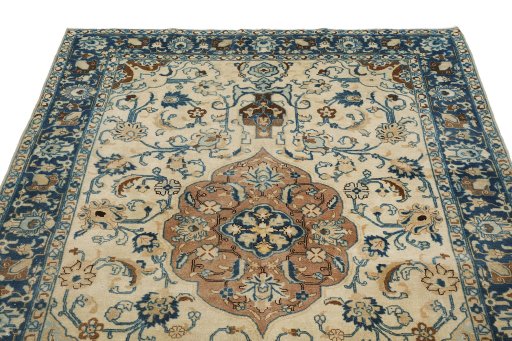 Surface texture of 1940s Tabriz rug with natural Wool and intricate pattern