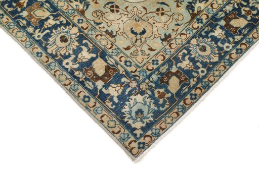 Backside of handmade 1940s Tabriz rug showing knot structure and weave density