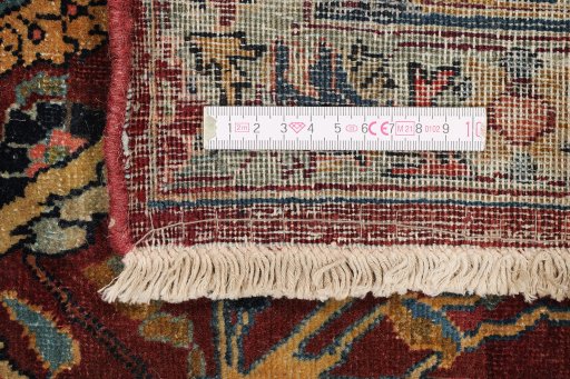 Corner detail of 1930s Tabriz rug showing border pattern and Wool pile