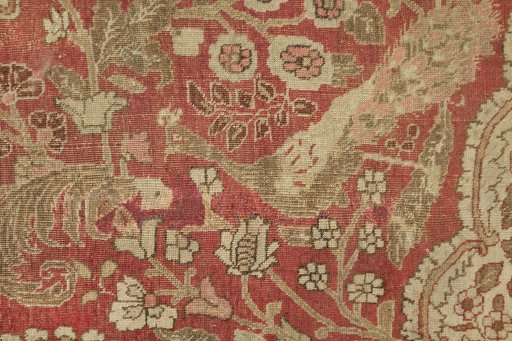 Close-up detail of 1900s Tabriz rug from Iran / Persia showing Wool weave