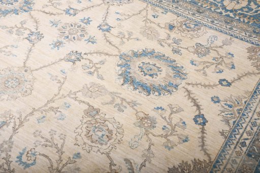 Corner detail of New Tabriz rug showing border pattern and Wool pile